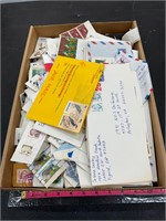 Box lot of hundreds of postage stamps Ephemera