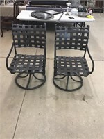 Great pair of swivel metal patio chairs
