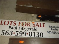 large sign    "Lots For Sale"