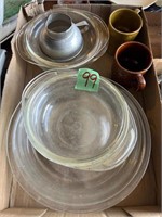 Pyrex covered dishes, coffee cups, funnel, and