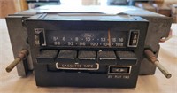 Ford AM/FM Cassette play radio. Model 7809.