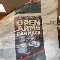 huge open arms farmacy window cling advertising