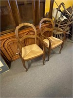 Pair of Cane Captains Chairs