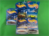 Five vintage hot wheels on cards collector item