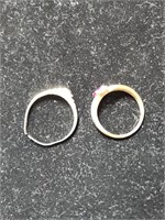 TWO RINGS MARKED 10K WITH UNKNOWN STONES
