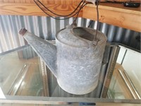 C- VINTAGE WATER CAN AND HORSE SHOES