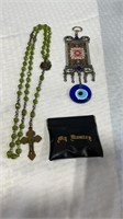 Pendant and rosary and bag.