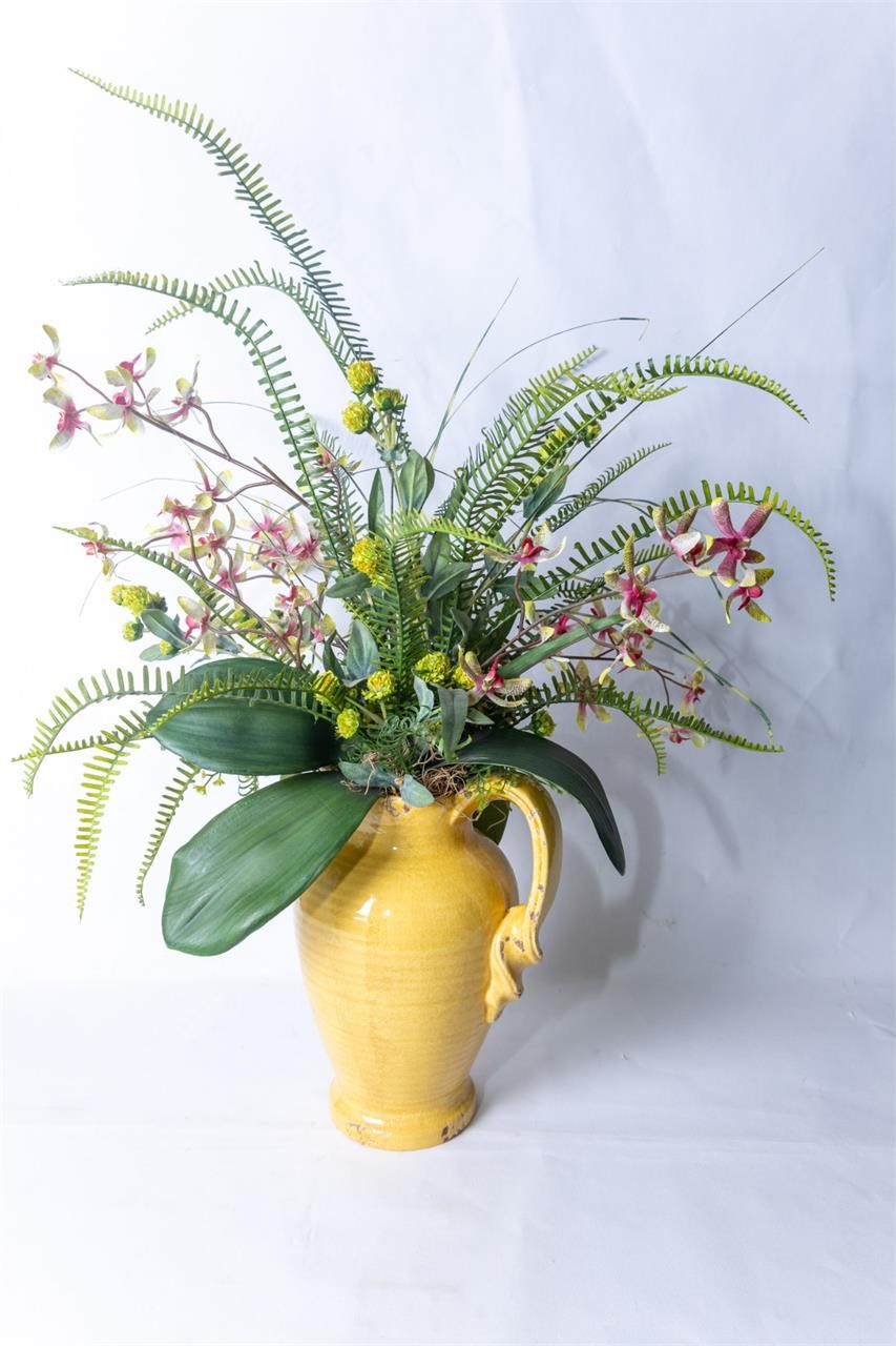 Yellow pottery vessel with faux fern and flowers