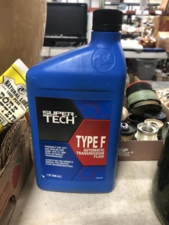 PAIR OF OIL CANS AND TRANSMISSION FLUID