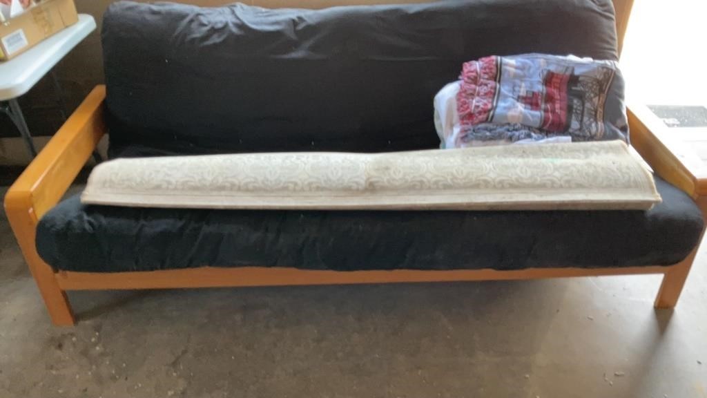 Futon with Wood Frame, Area Rug with Stains,