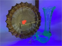Glowing uranium glass, shamrock glass and vase.