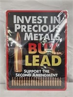 2 metal buy lead signs