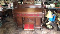 Antique walnut organ works but the cabinet needs