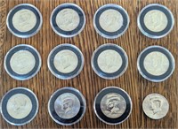 12 uncirculated Kennedy Half Dollar coins. In