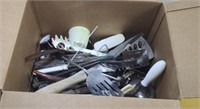 Assorted kitchen utensils in one box.