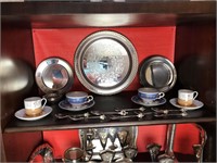 Silver plated plates, tea cups, and spoon lot