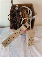 Box of extension cords, power strips