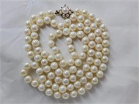 Strand 33" cultured pearls, 14K clasp w/ diamonds