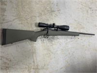 HOWA MOD 1500 6.5 CREEDMOOR AND SCOPE