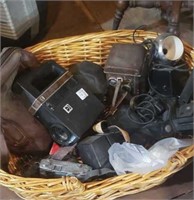 Basket of vintage cameras