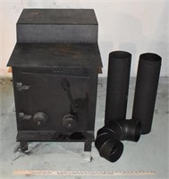 WOOD BURNING STOVE W/ STOVE PIPE