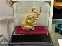 BEAUTIFUL GOLD COLORED ELEPHANT IN CASE