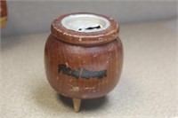 A pot of money wooden bank