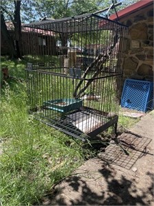 Metal cage. Approximately 5 1/2 foot tall by 4