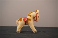 Small Toy Horse with Red Sadle