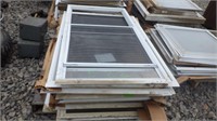 Pallet of 13 storm windows