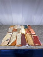 Assortment of higher end fabric with miscellaneous