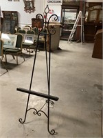 Black metal easel 66” tall