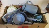 Vintage kitchen items including enamel pots,