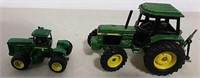 Two Ertl John Deere toy tractors