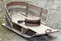 Vintage wooden sled and wooden pulley,