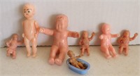 Lot of 7 Miniature Rubber & Plastic Toy Baby Dolls