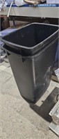 Two black garbage cans