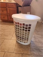 Rubbermaid Hamper filled with towels and cloths