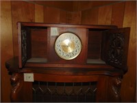 walnut mantle clock, ornate carved side doors