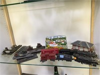 2 LIONEL TRAINS WITH SOME CARS, TUNNEL, TRACK & MO