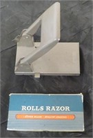 Vintage Rolls Razor and hole punch.