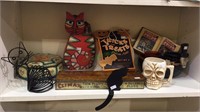 Shelf lot, Halloween decorations including skull