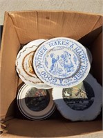 box of decorative plates