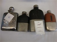 Four Edwardian flasks.