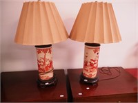 Pair of Asian scenic table lamps decorated with
