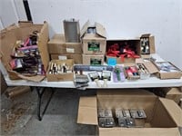 lot of paint brushes, rollers, & solvent cans