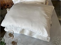 lot of two clean bed pillows