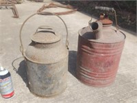 Old cream can with bail   galvanized gas can.