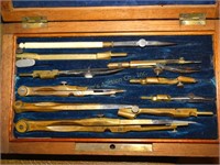 Vintage drafting instruments? In wood box