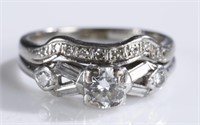 Ladies platinum, 10k, and diamond ring.